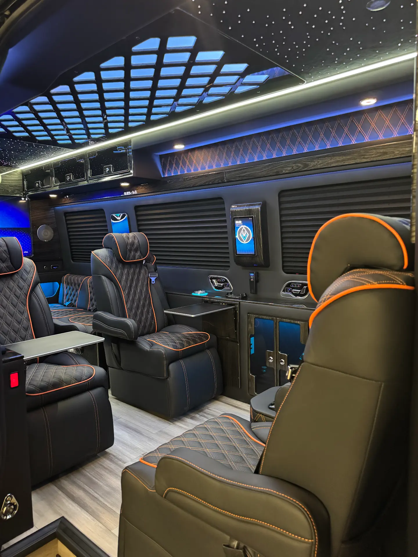 Custom eLegacy executive van interior with diamond-stitched seating